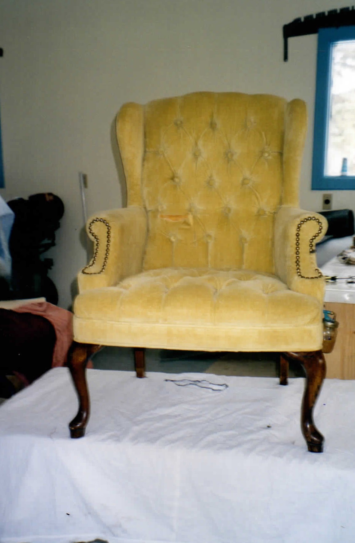 Floral armchair before reupholstery